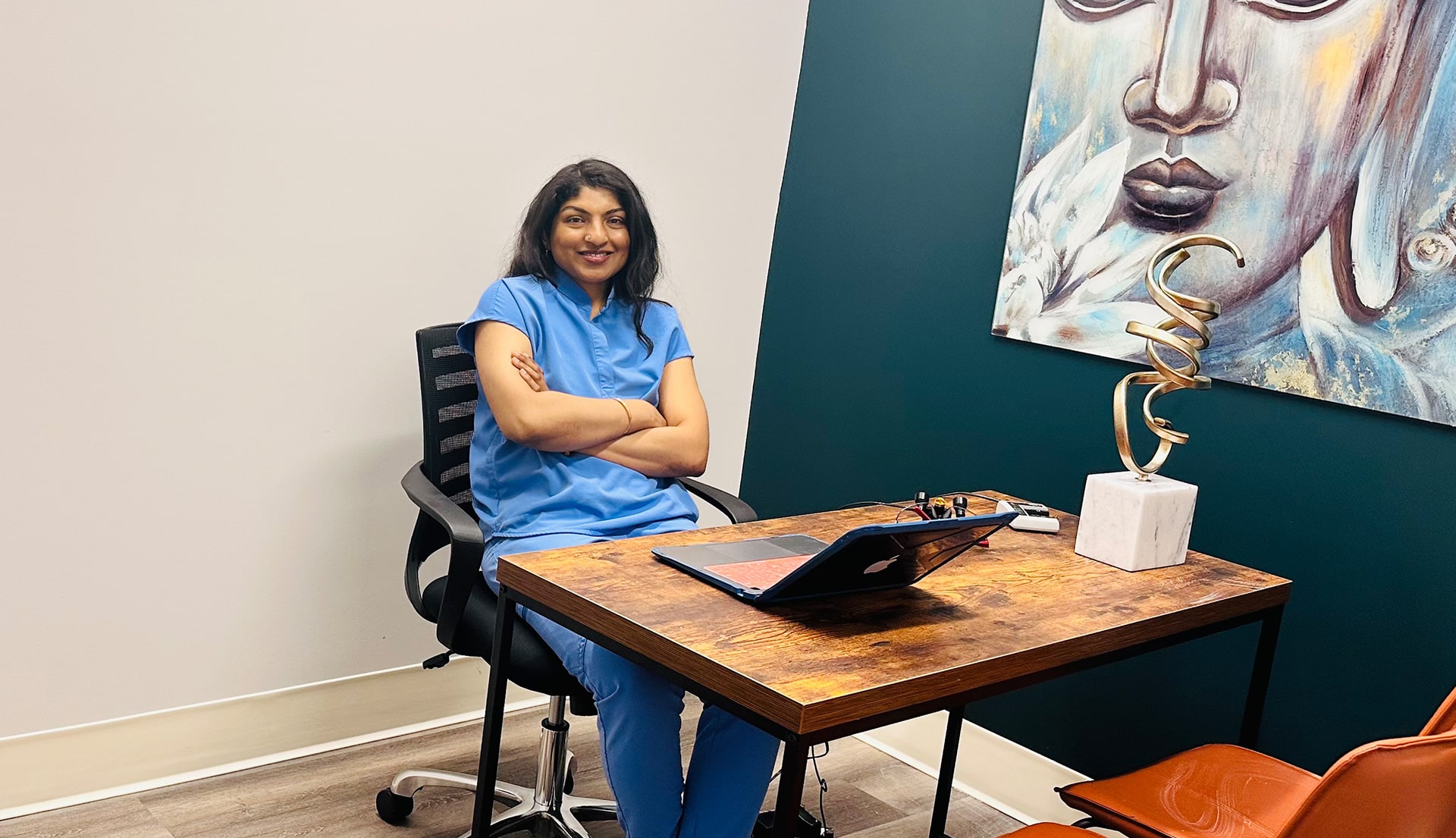 Dr. Anu Mohan sitting in her beautiful office